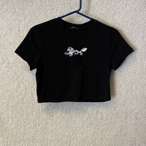 Shein crop top with a dragon.